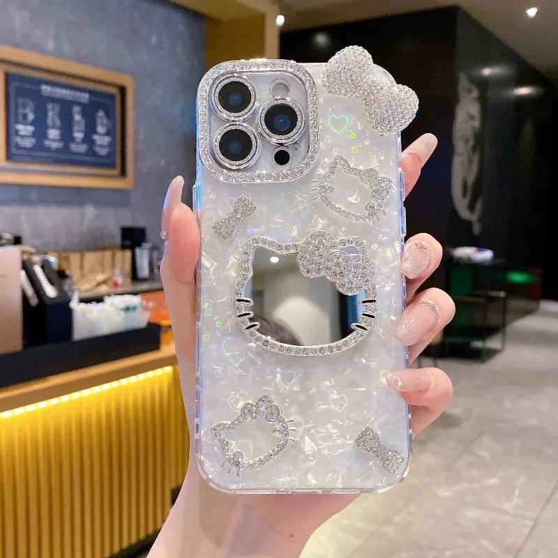 New Rhinestone Bow Tie Shell-Patterned KT Cat Glass Mirror Phone Case Cover Decorative Smartphone Protector for Iphone 16 15 14 13 12 Pro Max – Heart-Shaped Prismatic Protective Case