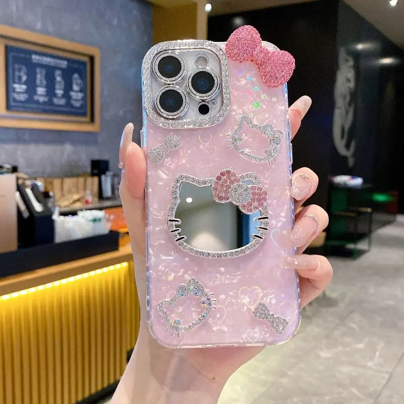 New Rhinestone Bow Tie Shell-Patterned KT Cat Glass Mirror Phone Case Cover Decorative Smartphone Protector for Iphone 16 15 14 13 12 Pro Max – Heart-Shaped Prismatic Protective Case