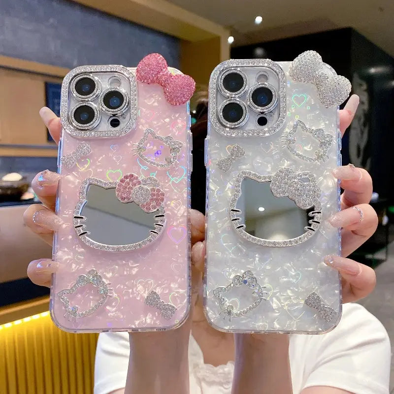 New Rhinestone Bow Tie Shell-Patterned KT Cat Glass Mirror Phone Case Cover Decorative Smartphone Protector for Iphone 16 15 14 13 12 Pro Max – Heart-Shaped Prismatic Protective Case