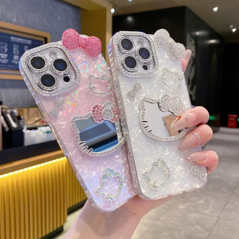 New Rhinestone Bow Tie Shell-Patterned KT Cat Glass Mirror Phone Case Cover Decorative Smartphone Protector for Iphone 16 15 14 13 12 Pro Max – Heart-Shaped Prismatic Protective Case