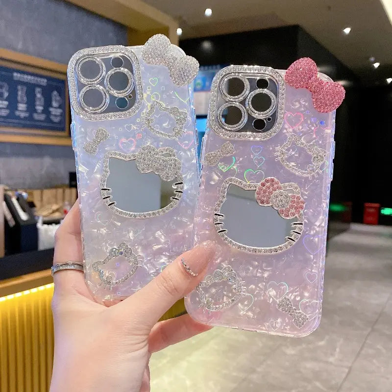 New Rhinestone Bow Tie Shell-Patterned KT Cat Glass Mirror Phone Case Cover Decorative Smartphone Protector for Iphone 16 15 14 13 12 Pro Max – Heart-Shaped Prismatic Protective Case